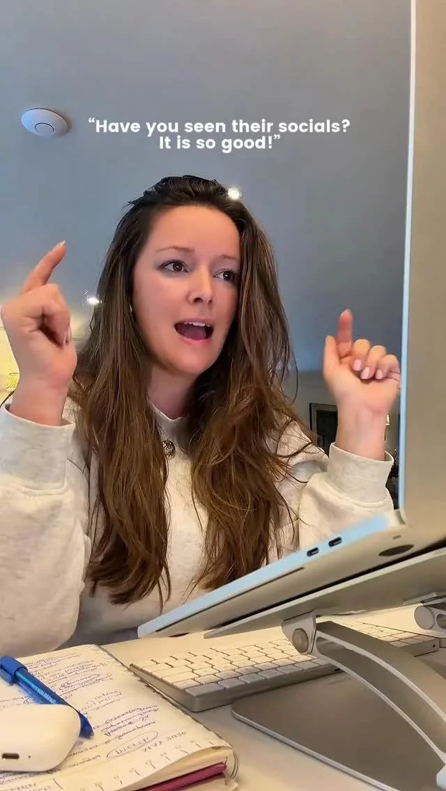 A woman pointing up beside the caption Have you seen their socials? It is so good